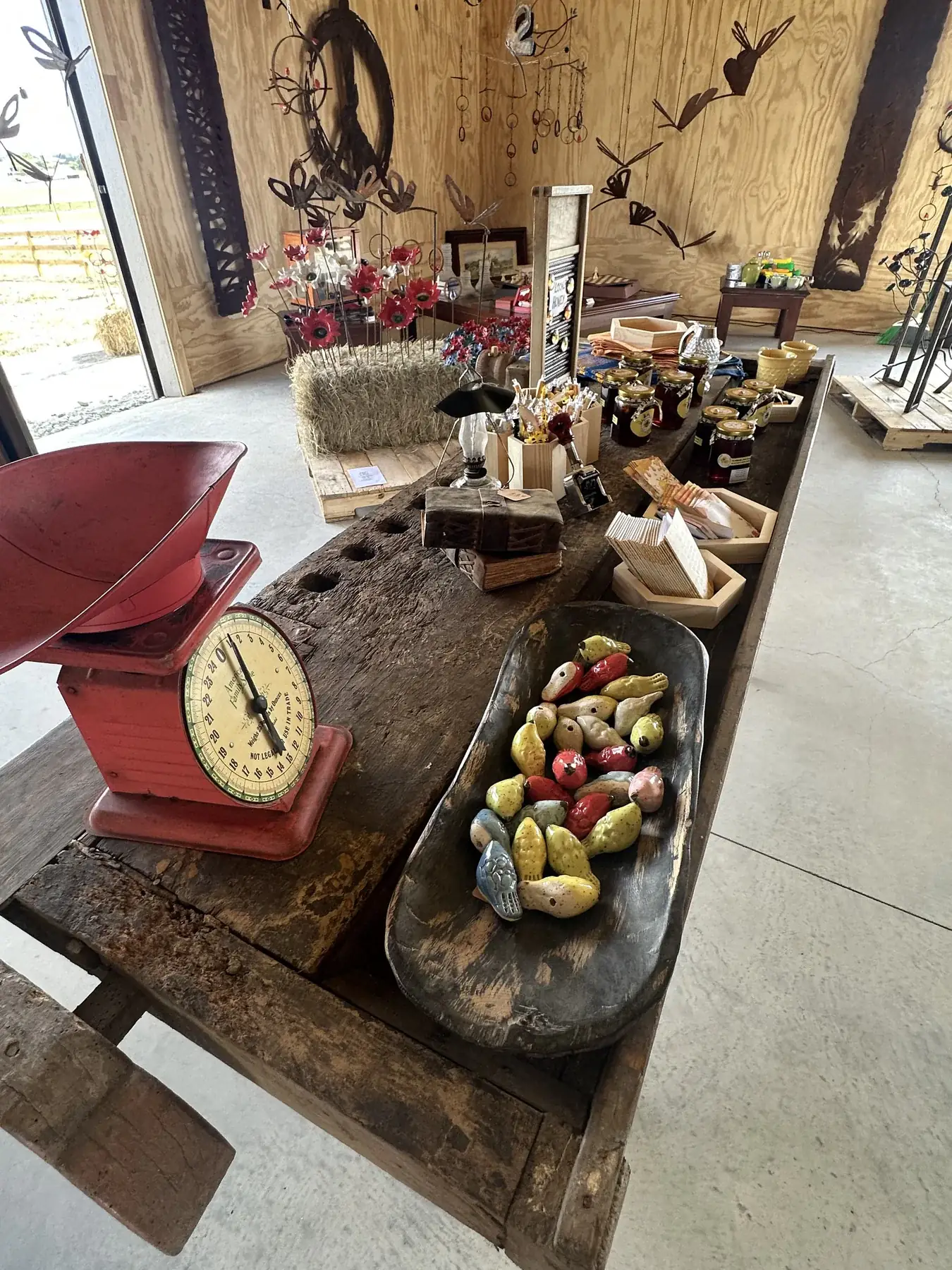 Vintage scale, ceramics and artisan objects arranged at The Hive