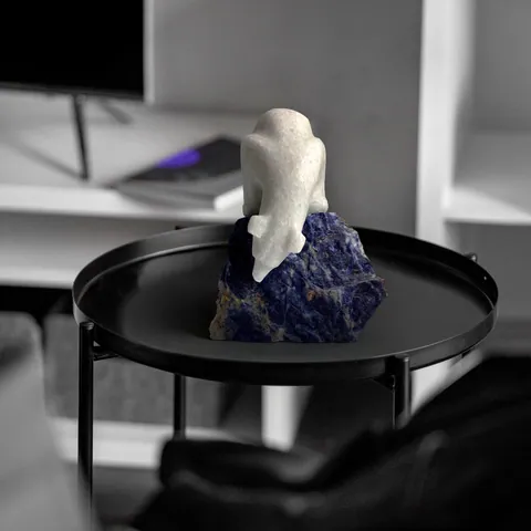 Carved dolphin on a mineral base